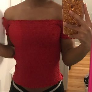 Red off the shoulder shirt